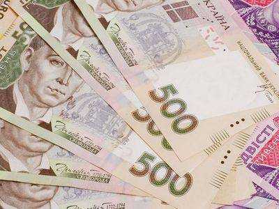 На межбанке к середине торгов гривня снизилась до 13,0000/13,3000 грн/долл.