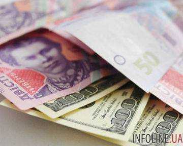 НБУ снизил курс гривны до 16,24 грн за долл.