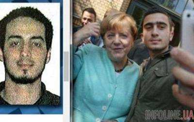 В интернете появилось фото Меркель с мигрантом, который похож на бельгийского смертника