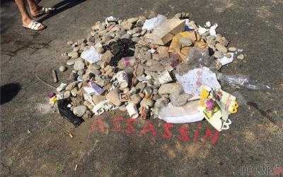 В Ницце люди заплевали и закидали камнями место, где был застрелен террорист