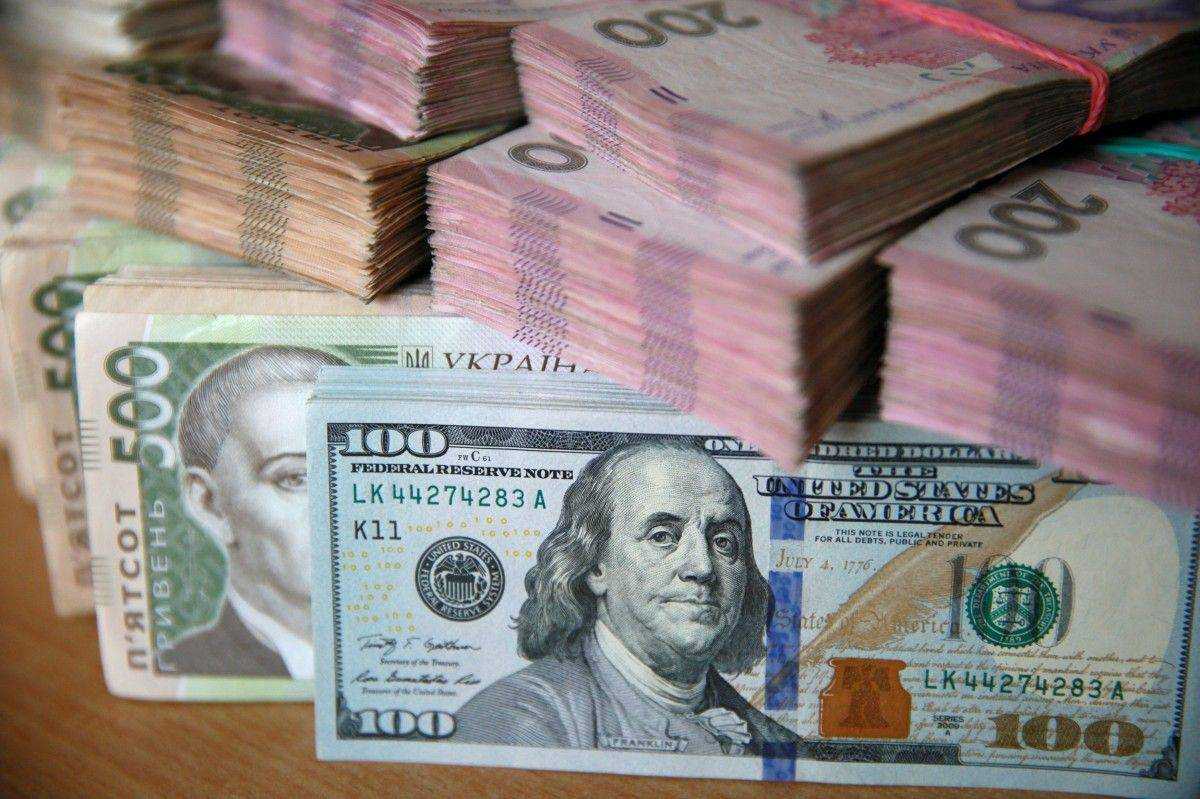 Официальный курс гривны установлен на уровне 24,61 грн/доллар
