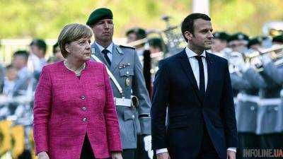Меркель и Макрон выступили за ужесточение санкций против КНДР