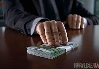 В Днепропетровской области полицейского задержали во время получения взятки в 1000 долларов