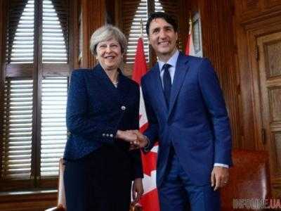 Мэй и Трюдо обсудили на саммите G7 Украину и КНДР