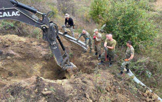 Дістали 175 кг вибухівки та багато мін. У Харківсбкій області розмінували дамбу